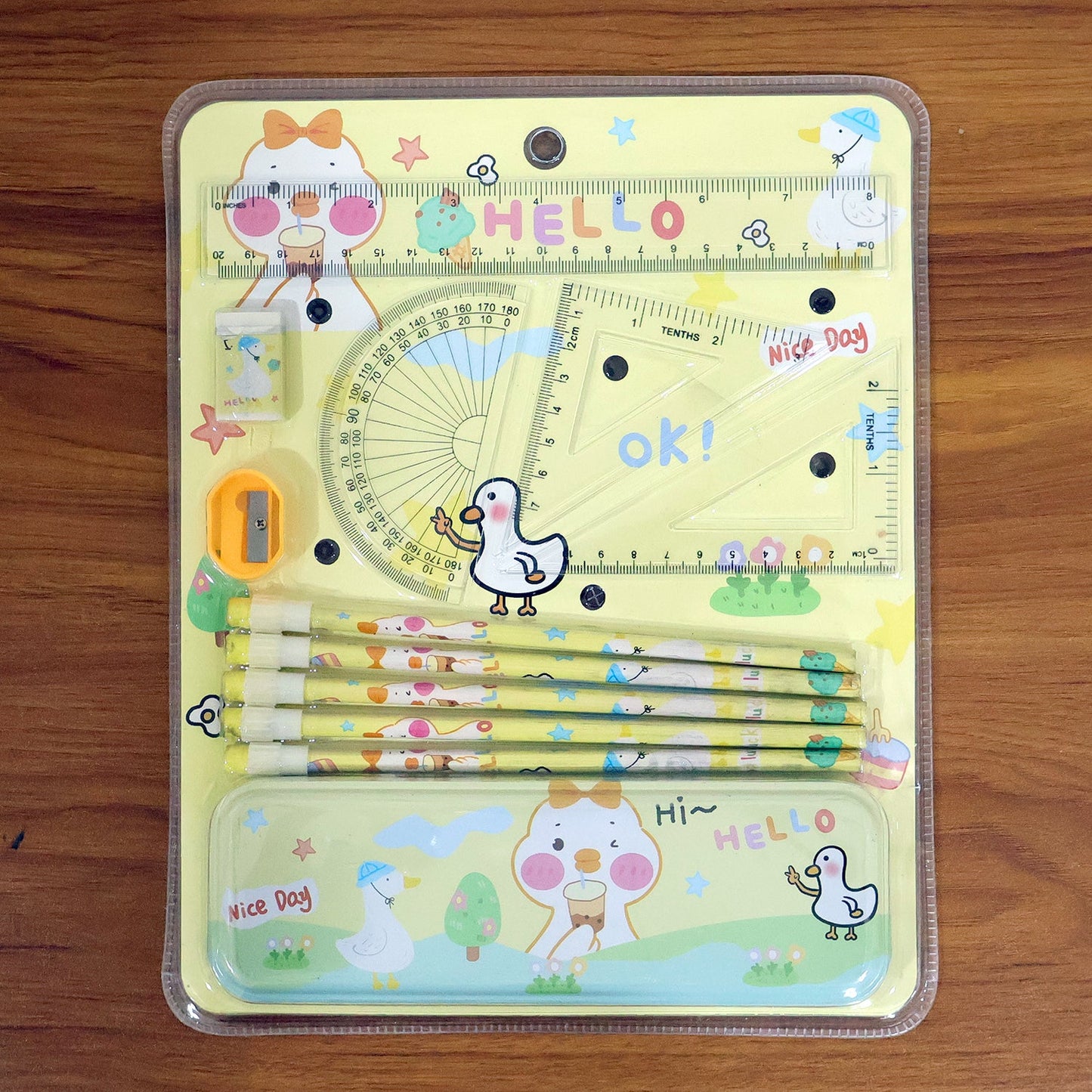 Kids school essentials set with geometry tools in colorful cartoon design
