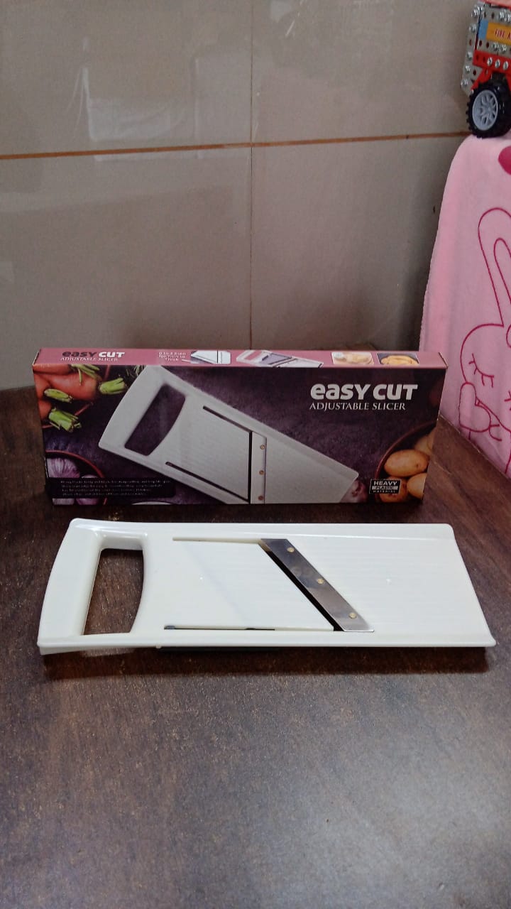 Compact kitchen slicer by Quickslice, perfect for everyday meal preparation.
