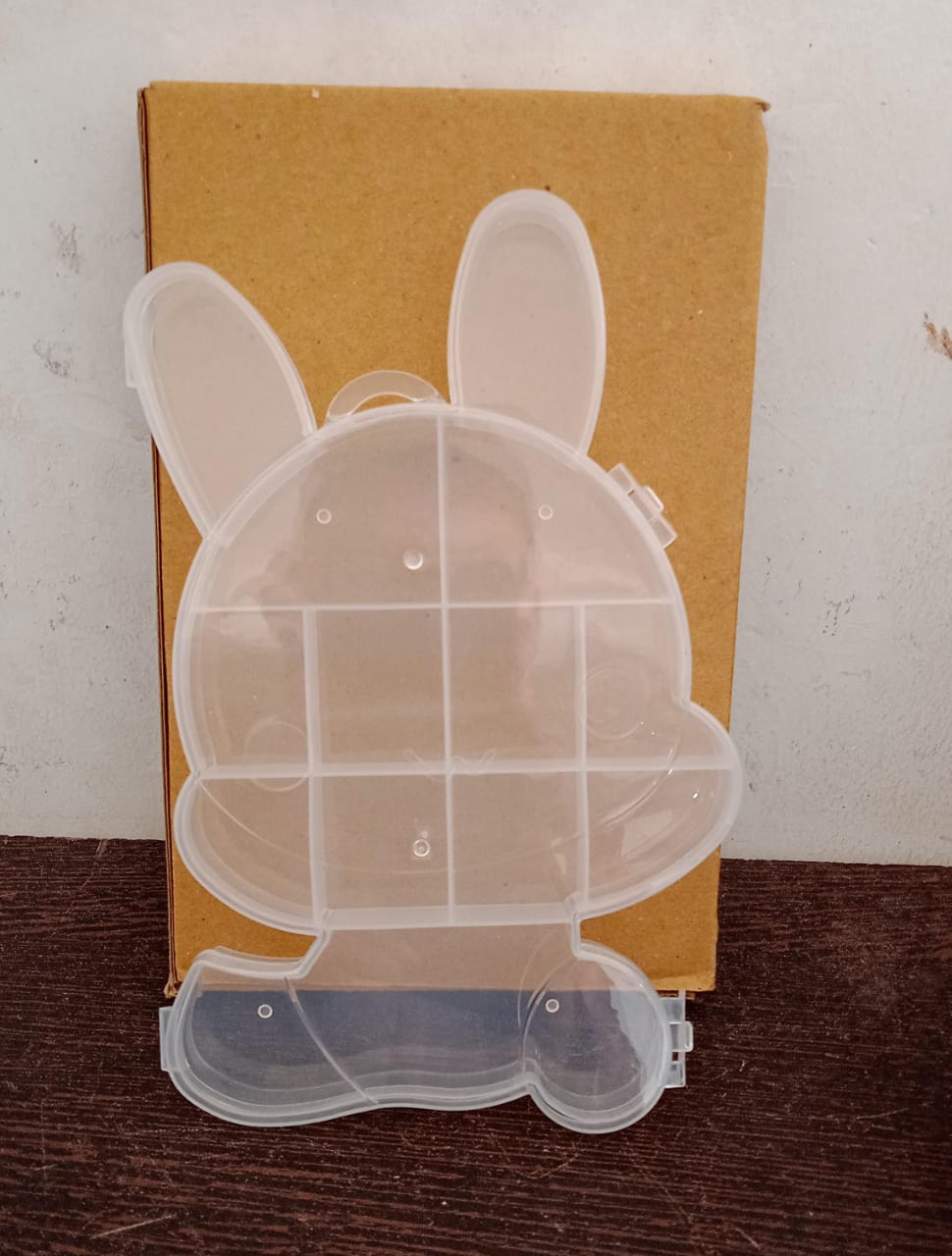 Top-down view of the transparent bear jewelry box, ready for daily use.