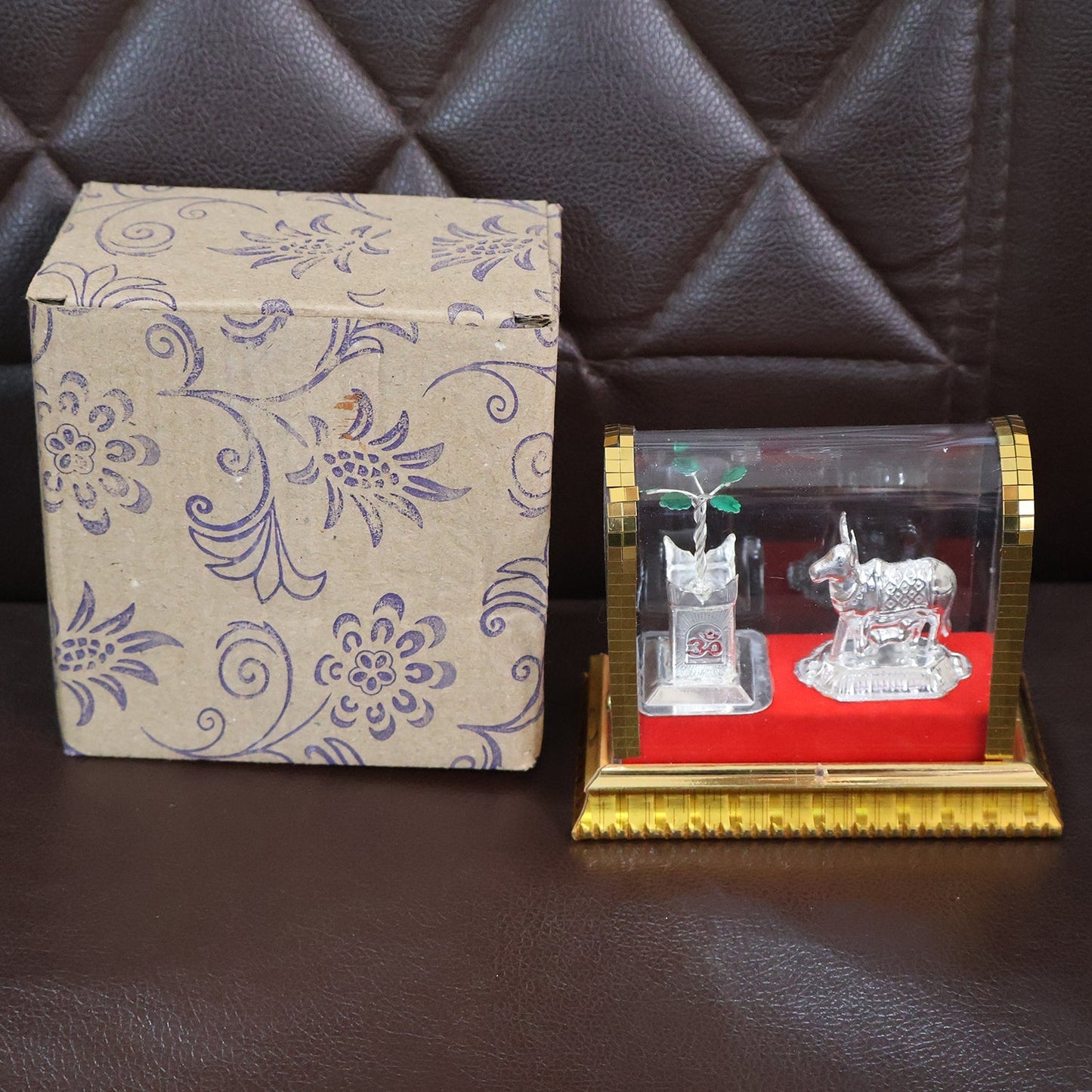 Decorative silver-plated Kamdhenu cow with calf and Tulsi plant idol set