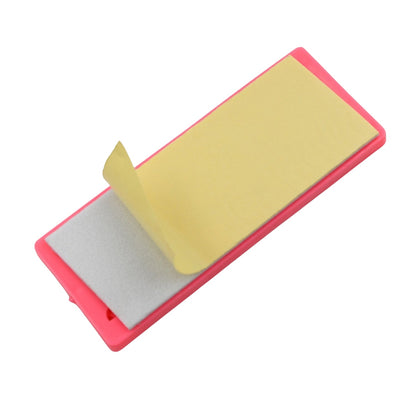 A wall-mounted Self Adhesive Plug Organizer neatly holding multiple device cables and chargers.