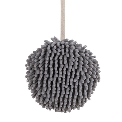 Plush hanging hand towel with convenient loop for easy placement.