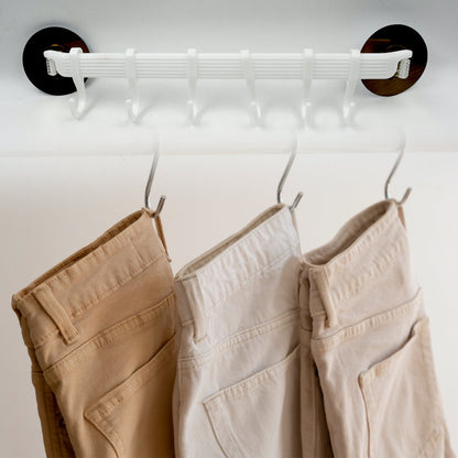 Side view of the sleek, wall-mounted towel holder rack in a minimalist design.