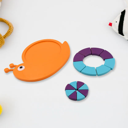 A child proudly displays their completed Snail Puzzle for Kids.