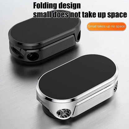 The magnetic phone holder mounted on a windshield, offering clear visibility.