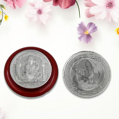 Side view of the round Ganesh coin, highlighting its silver-colored finish.
