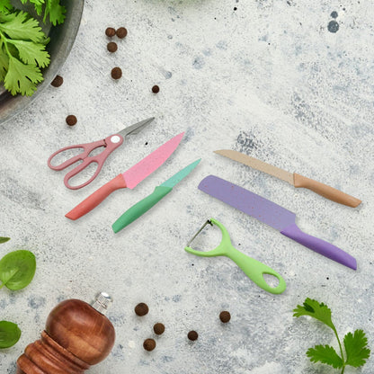 Aerial view showcasing all six pieces of the professional kitchen knife set.