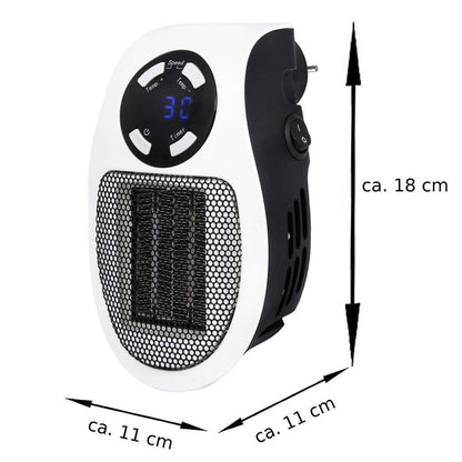 Energy-saving desktop heater plugged directly into a wall socket with its 360-degree rotating plug.