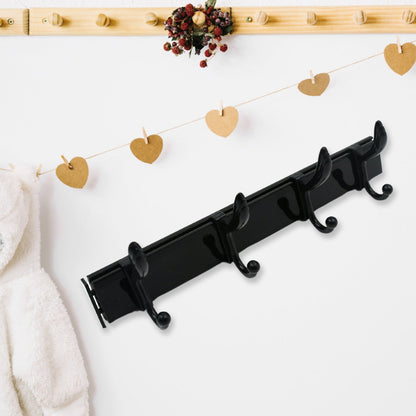 GlimmerHome wall mount coat hanger neatly installed in a modern entryway.