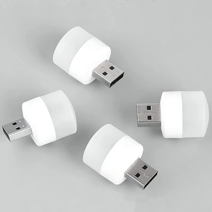 Portable USB bulb connected to a power bank, ready for emergency light situations.