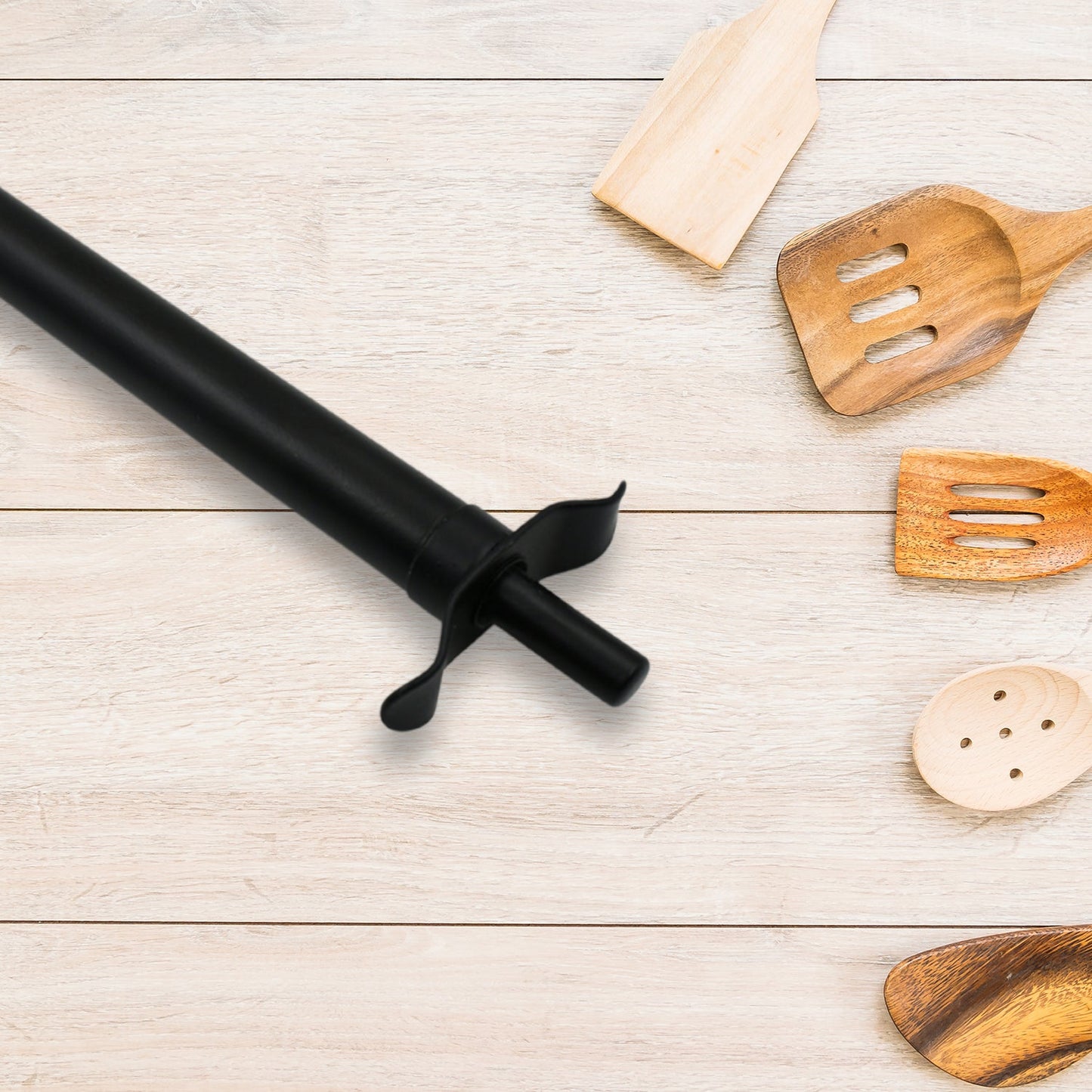 Kitchen gas stove being easily lit with the long spark stainless steel lighter.