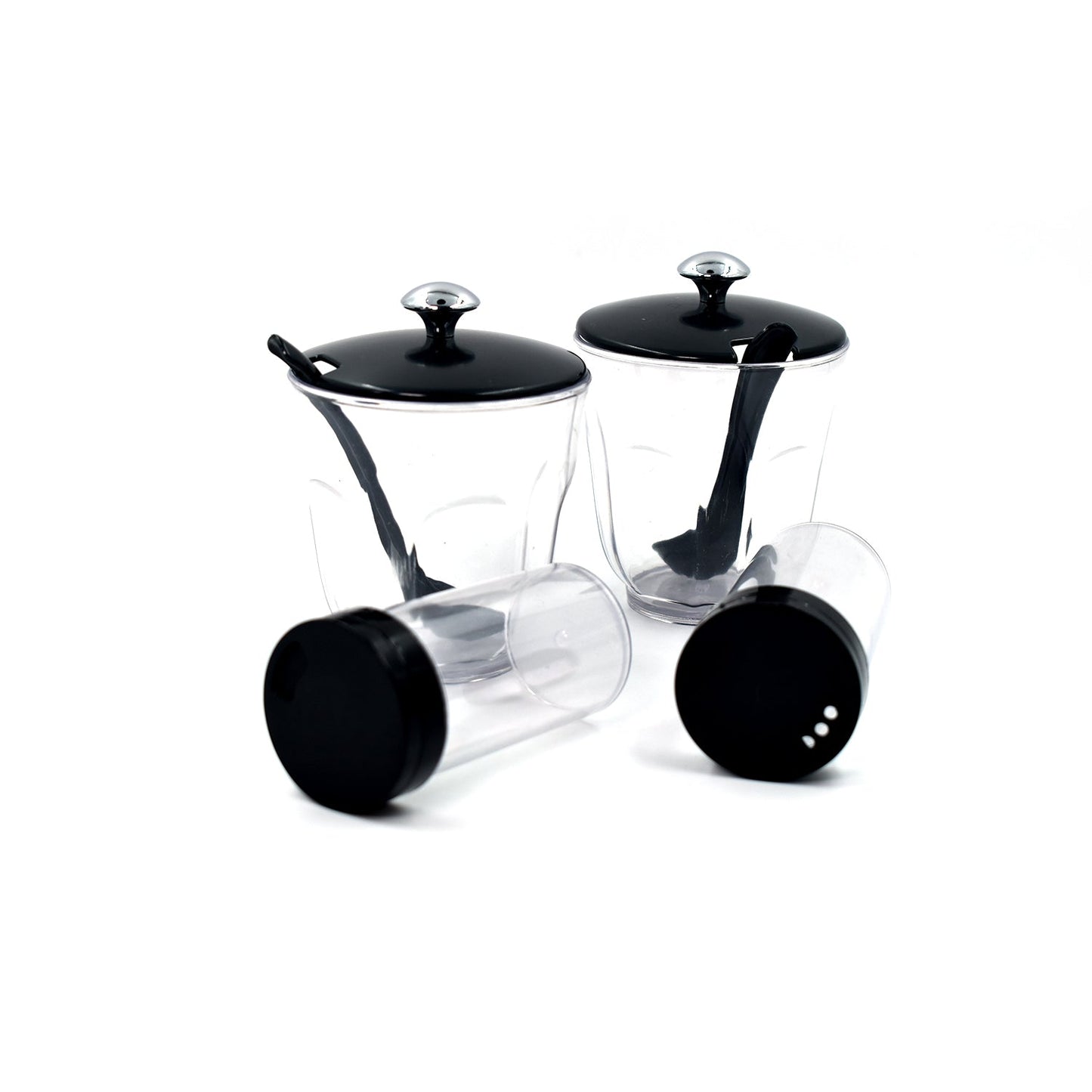 An Indian kitchen countertop featuring the Ganesh Spice Condiment Set for daily cooking.