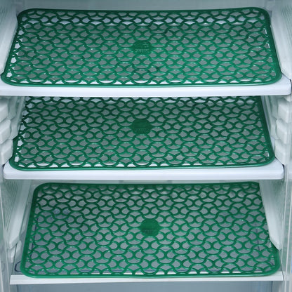 Fridge drawer mats preventing spills and scratches.