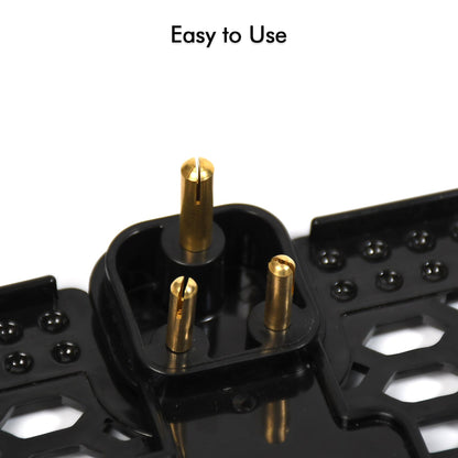 A mobile phone is securely held by the PHOBIA black wall charging stand.