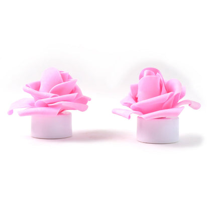 Romantic flickering LED tealight candle shaped like a rose flower