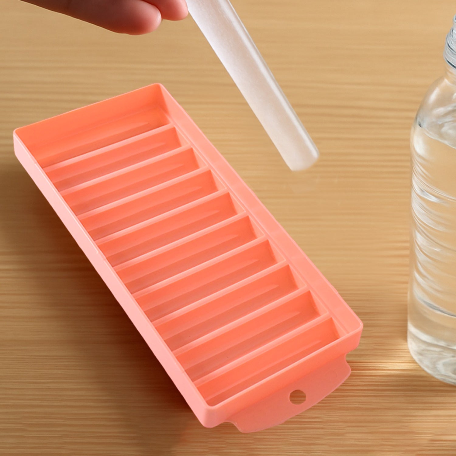 Easy release ice stick maker for bottles