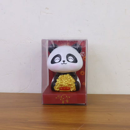 Multiple solar panda figurines in various poses, emphasizing their charm as car interior accessories.
