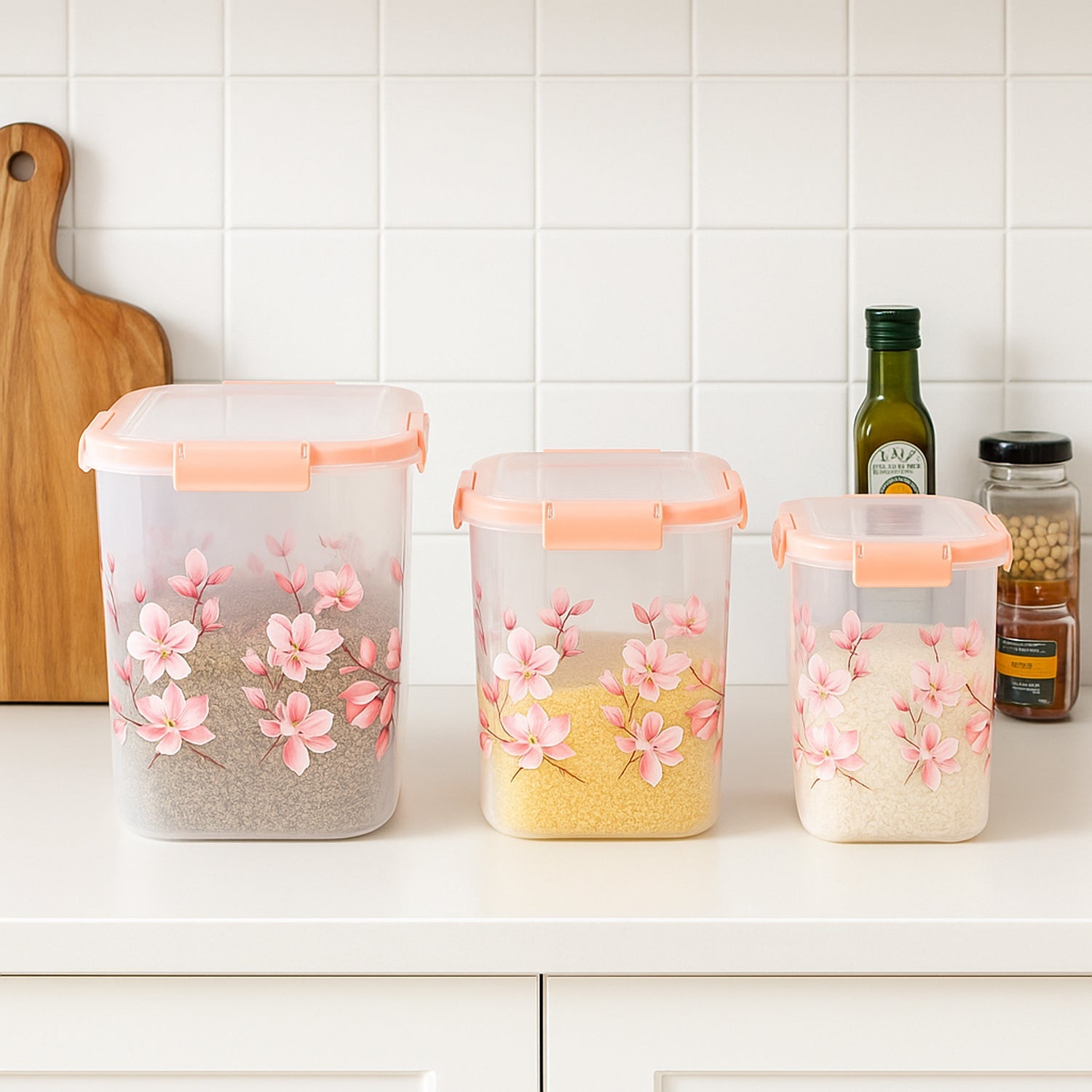Square floral airtight containers holding dry goods like rice and pulses.
