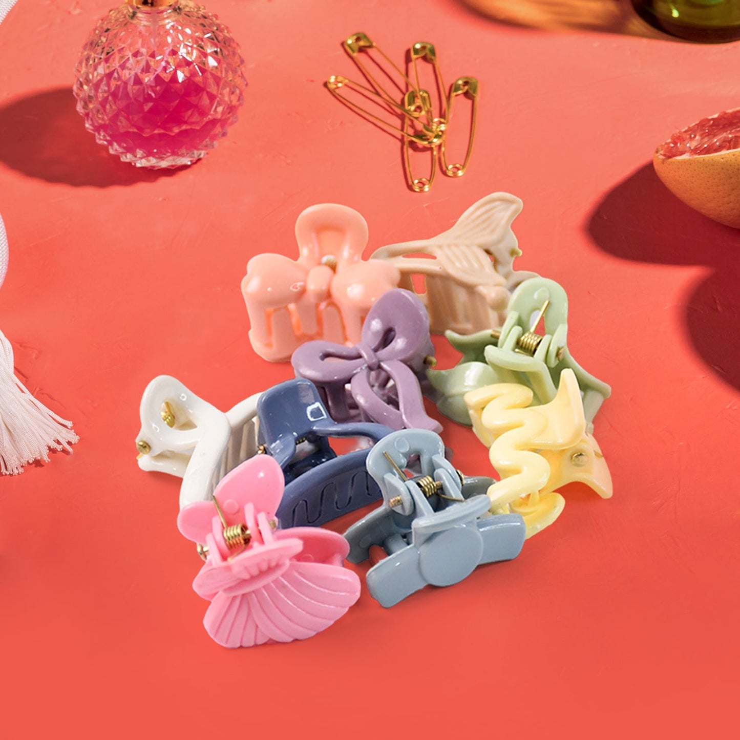 Assortment of bright mini butterfly hair claws, perfect as multicolour hair accessories.