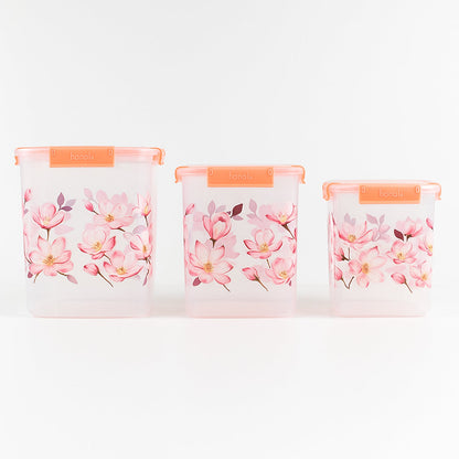 Stackable floral food storage container set with transparent bodies.