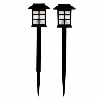 A pair of black solar garden lights with white grid panels are shown standing upright against a plain white background.