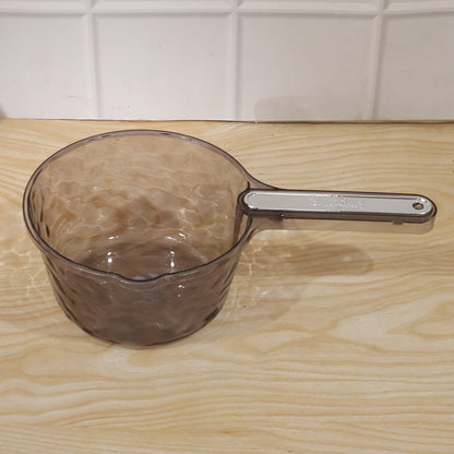 Daily household use of water dipper scoop for various tasks