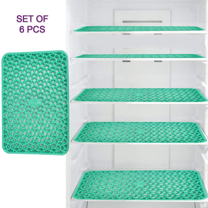 A set of fridge mats designed for hassle-free cleaning.