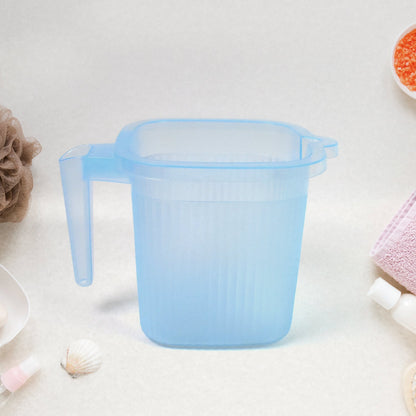 Ergonomic Transparent Bath Mug, highlighting its comfortable design.