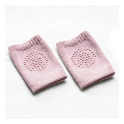 Pair of soft crawling knee pads in grey, designed for toddler comfort and safety.