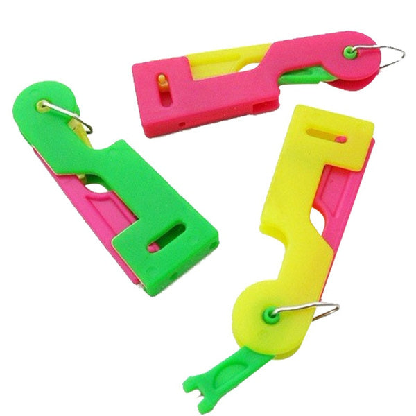 Compact automatic needle threader for effortless sewing, perfect for travel.