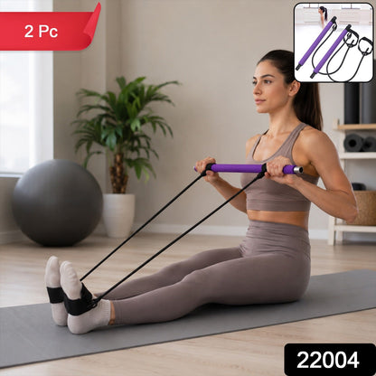 Person demonstrating yoga stretches using the resistance band exercise bar.
