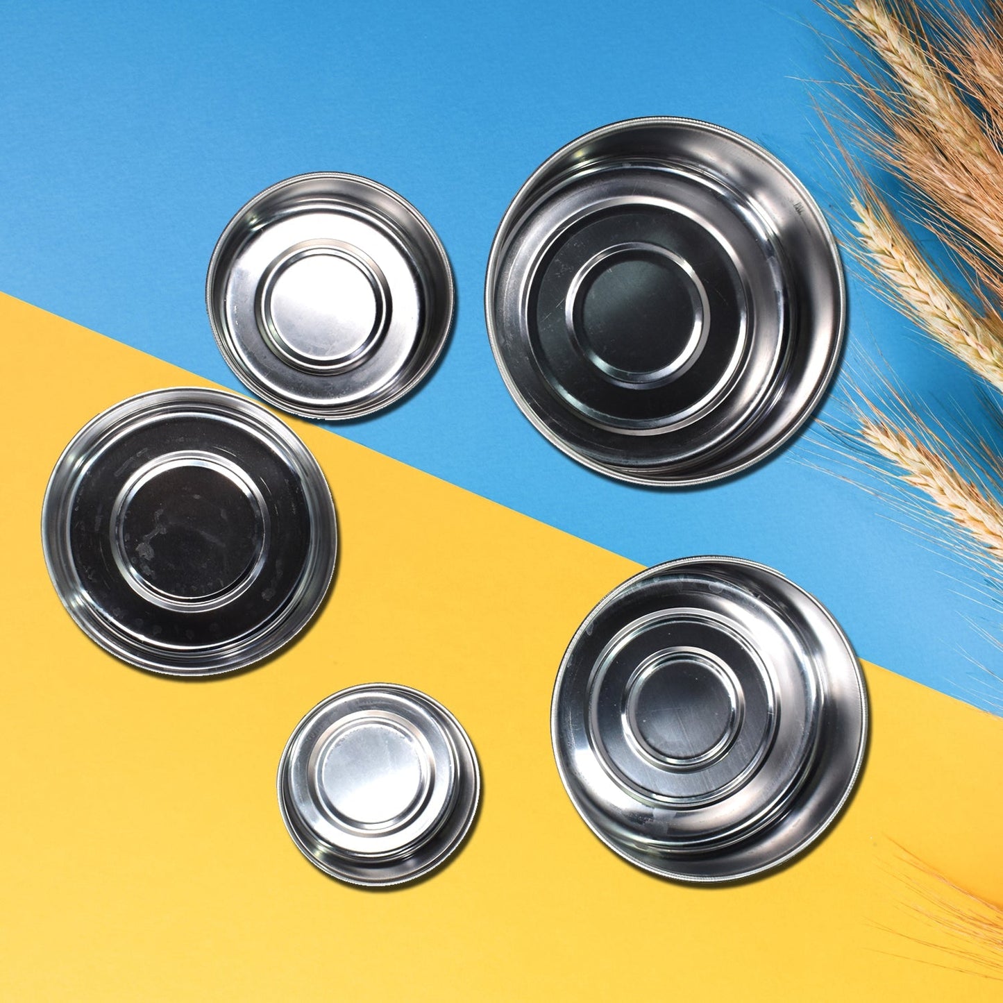 Stainless steel lunch box set with vibrant lids, ideal for daily meals.