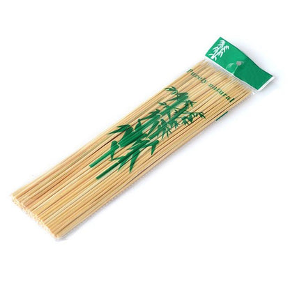 Detailed view of the pointed end of a natural bamboo skewer, perfect for piercing.