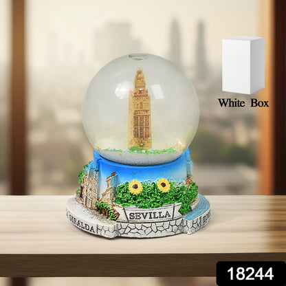 Close-up of the elegant snow globe design, highlighting its intricate details.