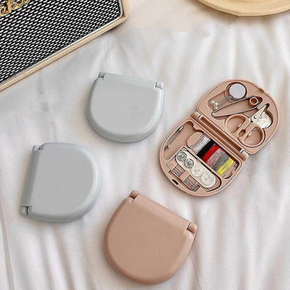 Mini Travel Sewing Kit displayed open with all tools spread out.