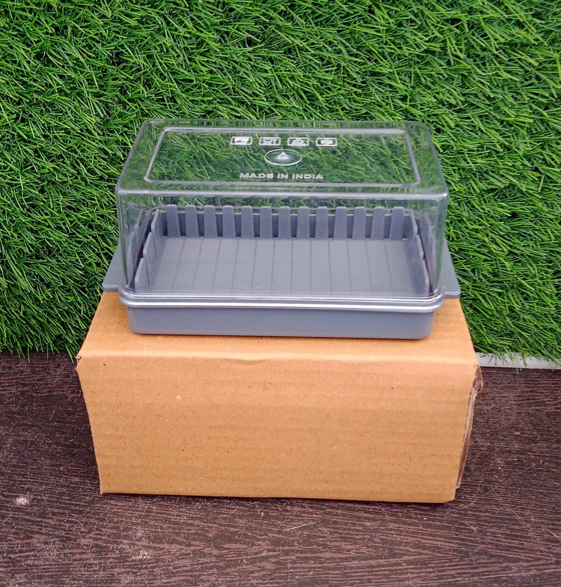 Compact butter slicer box, showing its practical design for efficient kitchen storage.