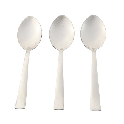 Three stainless steel dining spoons arranged side by side for tableware