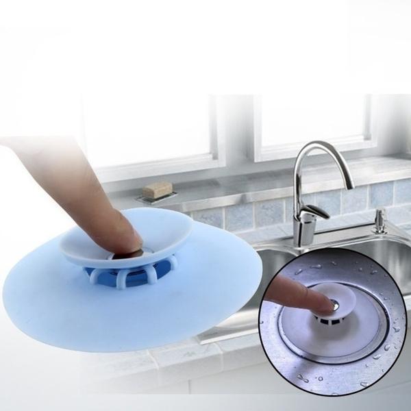 Close-up view of multicolor silicone sink cover with drainage holes