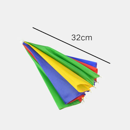 A folded, colorful red, yellow, green, and blue umbrella hat is shown at an angle, with a black line indicating a 32cm