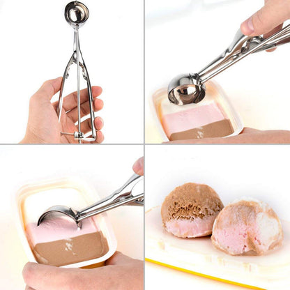 Close-up of the deep, curved bowl of the stainless steel ice cream scoop.