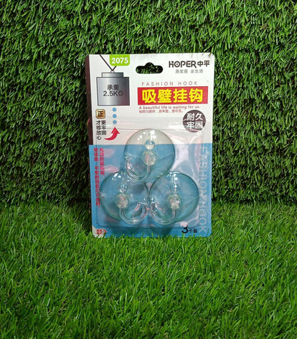 GlimmerHome transparent vacuum suction hooks in a modern kitchen setting.