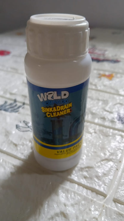 Drain cleaning powder effectively removing blockages from a kitchen sink.