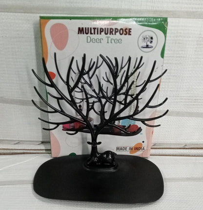 Jewellery hanging tree stand in deer shape with earrings and necklaces organized