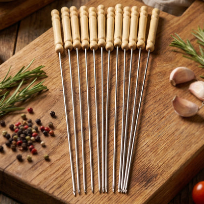 Long stainless steel skewers with wooden handles for outdoor grilling