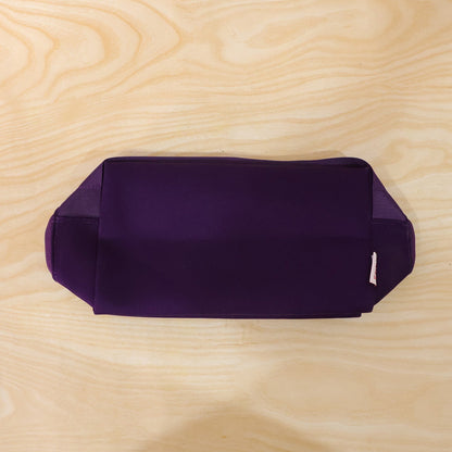 Travel makeup organizer bag in use, waterproof design