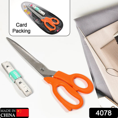 Close-up of ergonomic handles on tailor scissors, designed for comfortable grip during sewing.