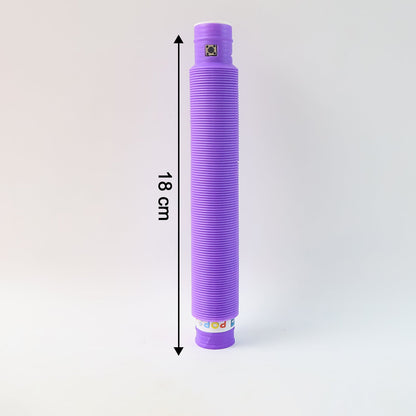 Multiple glowing LED Pop Tubes in vibrant mixed colors