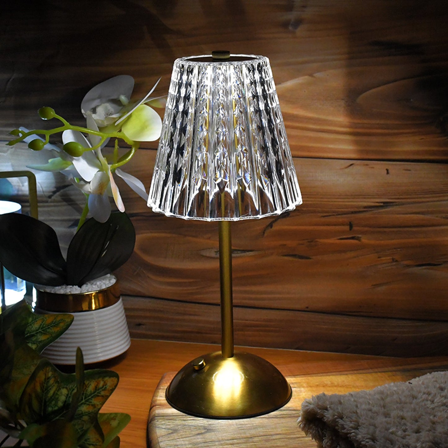 Crystal shade and sturdy metal base detail of LED table lamp