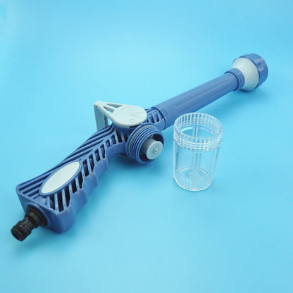 Handheld turbo water spray gun used as a cleaning tool for various surfaces.