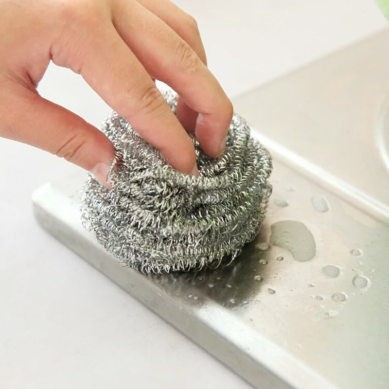 Durable round stainless steel scrubbers for deep cleaning pots and pans.